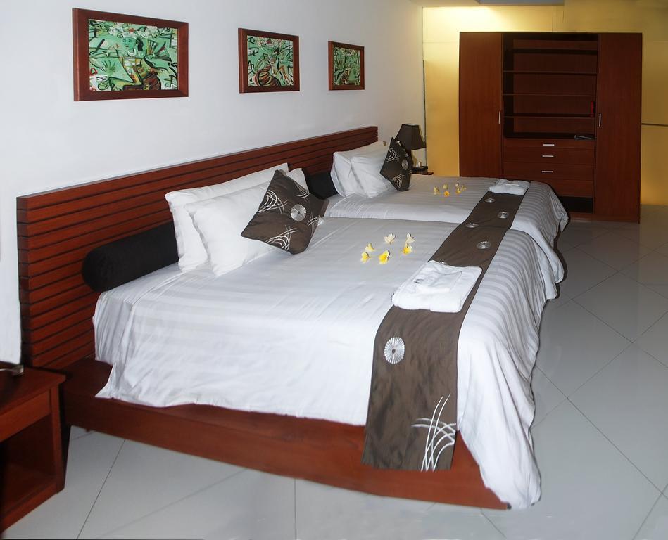 Mango Villa Sanur Номер фото
